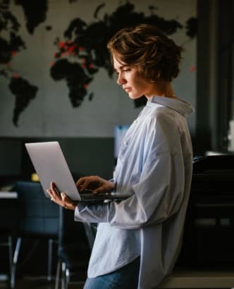 Researcher holding a laptop