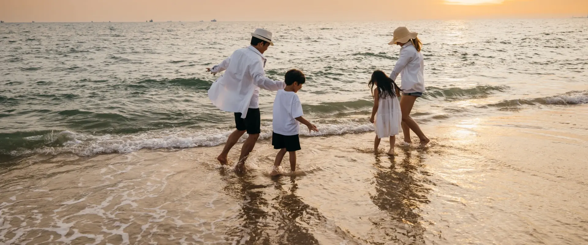 Family enjoying beach vacation
