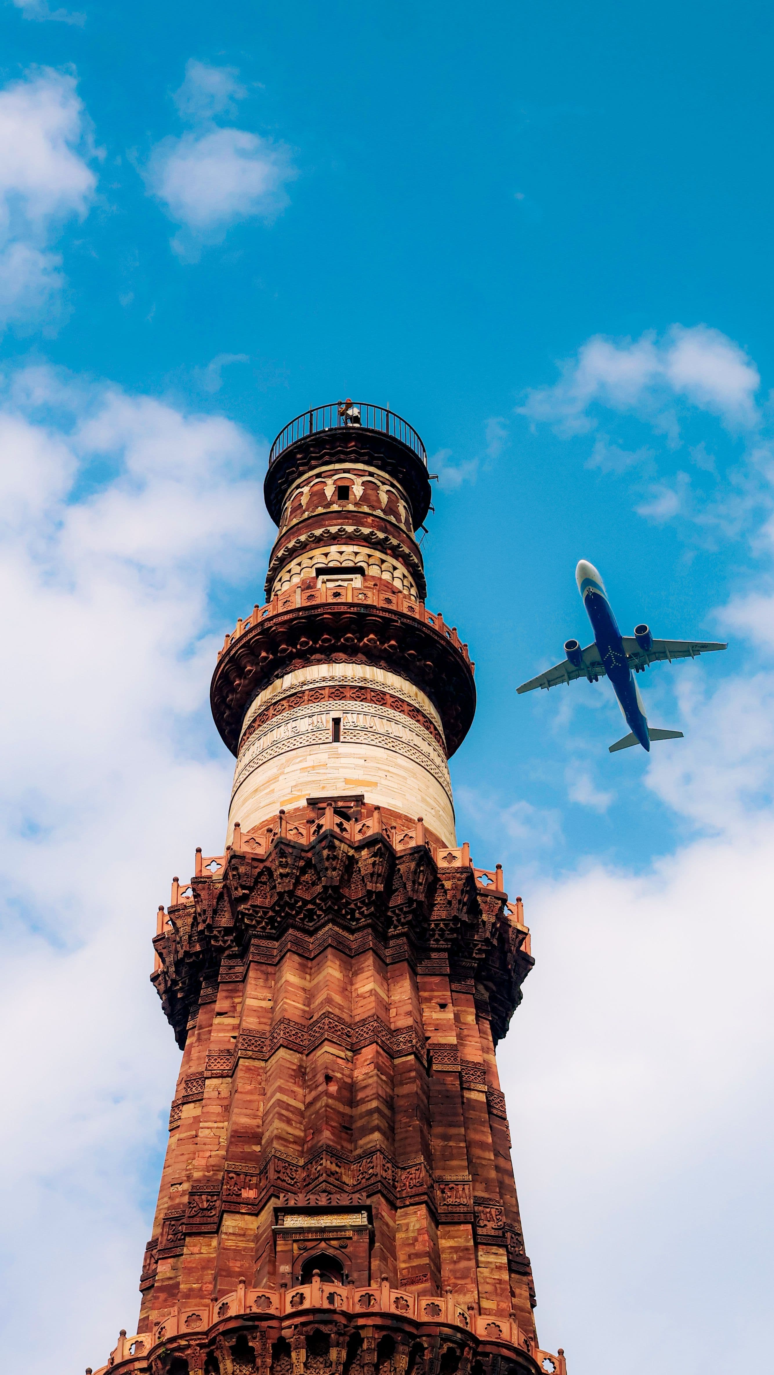 quitab minar with flight above